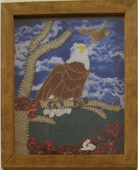 Hand stitced Eagle on branch tapestry full details